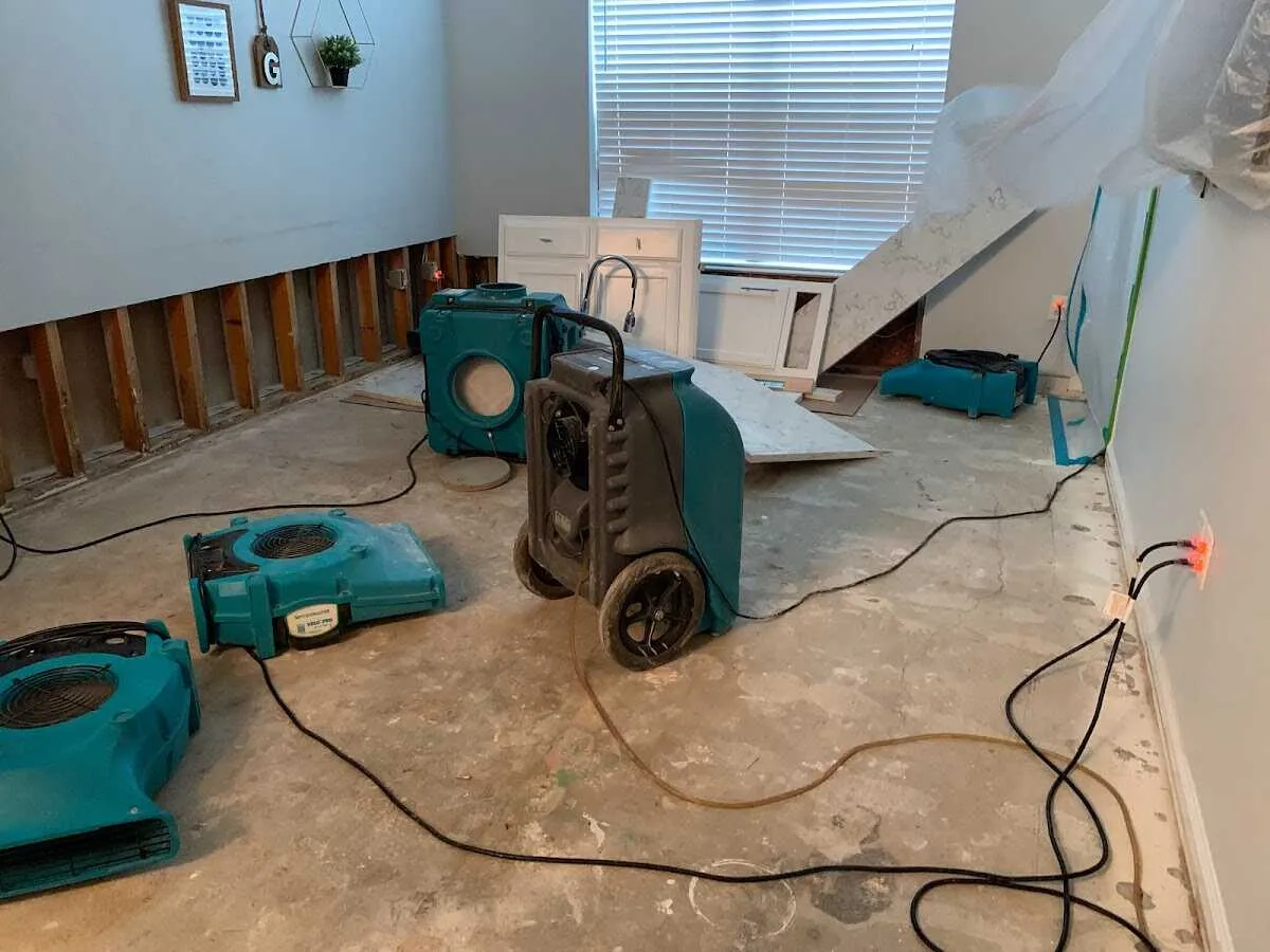 Dehumidifier in flood-cut room for Water Damage Restoration in Calhoun